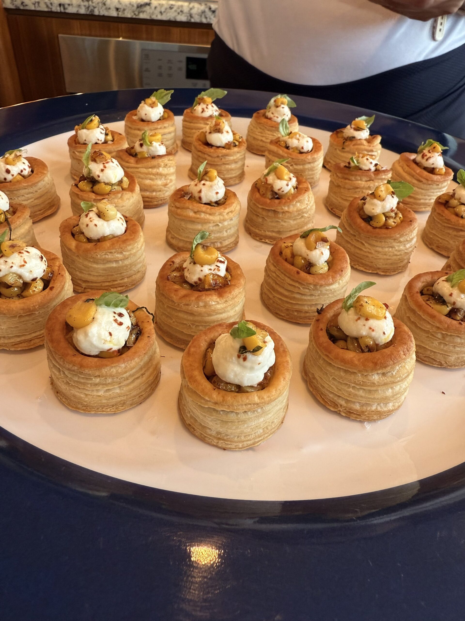  hors d'oeuvres  - puff pastry tartlets with ricotta, corn, caramelized onion