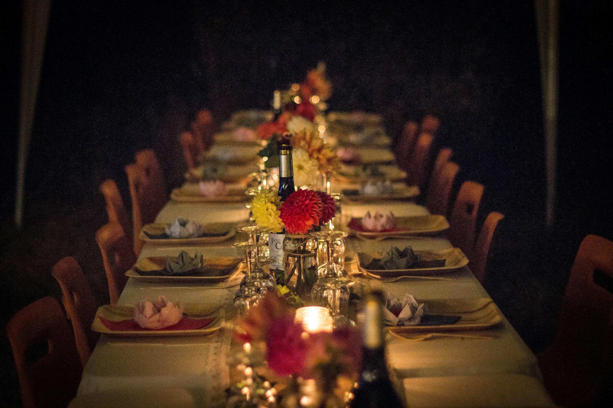Long elegant table set for an evening dinner